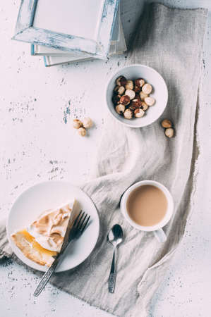 Coffee, cake and nuts on the old table. Breakfast conceptの写真素材