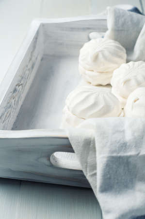 Vanilla marshmallow in a white wooden box on a white backgroundの写真素材