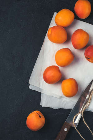 Fresh apricots on dark concrete backgroundの写真素材