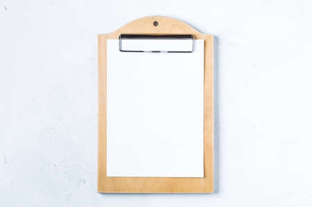 Notebook on a white concrete background. Mock up for text or designの写真素材