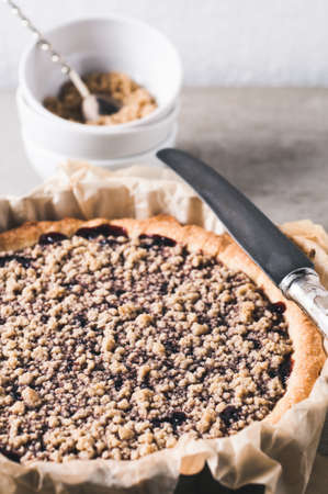 Fresh homemade jam pie on a grey concrete backgroundの写真素材