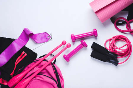 Sports equipment for fitness and gymnastics on white background. Flat lay and top viewの写真素材