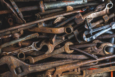 Background of old rusty tools. The concept of workshop or repairの写真素材