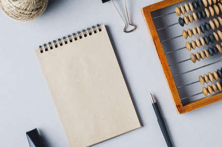 Old wooden abacus on grey background. The concept of bookkeeping, business or saving moneyの写真素材
