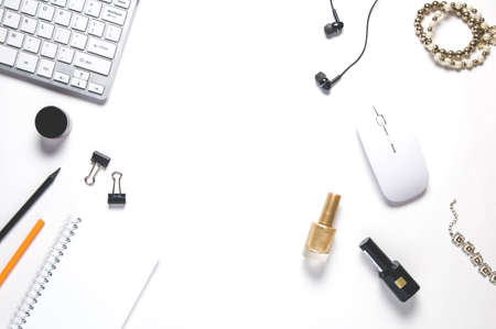 Keyboard and women's accessories on white background. Beauty blogger concept