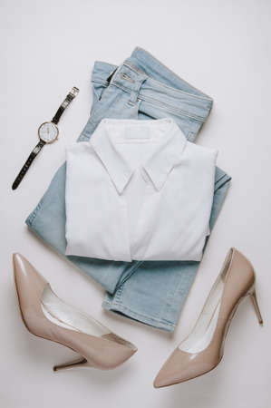 Women's clothing on a pale background. Flat lay and top viewの写真素材