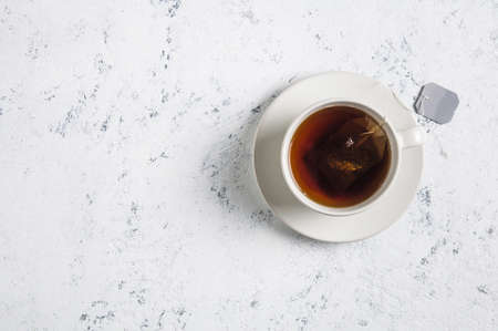 Cup of tea on white background. Top view
