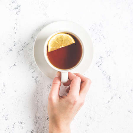 Cup of tea on white background. Top view
