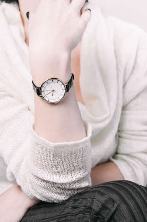 Wristwatches on women's hand