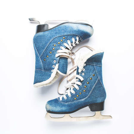 Old women's skates on a white background