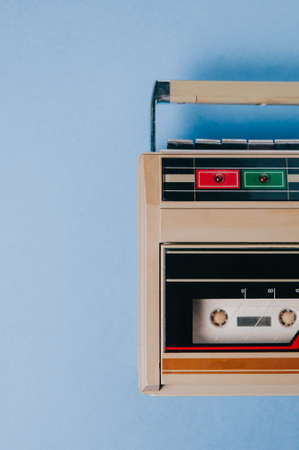 Old cassette tape recorder on a blue backgroundの写真素材