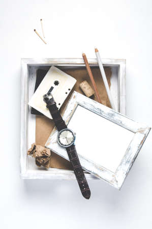 Unnecessary things in a white wooden box