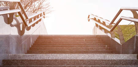 Stairway with metallic banister. The concept of success or climbing
