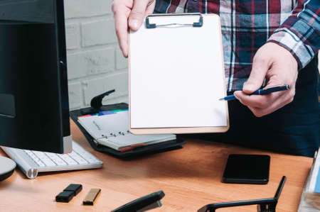 Signing an agreement or contract. The concept of office work