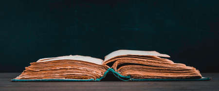 Old book on dark background