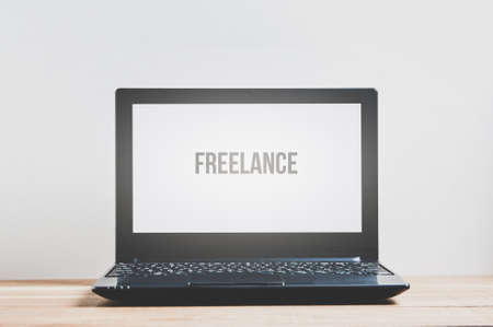 Laptop on a pale background. Template for text or designの写真素材