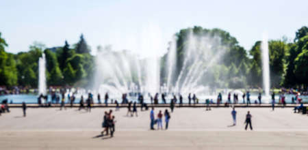 Blur and defocus. People walk in the Park. The concept of the urban landscapeの写真素材