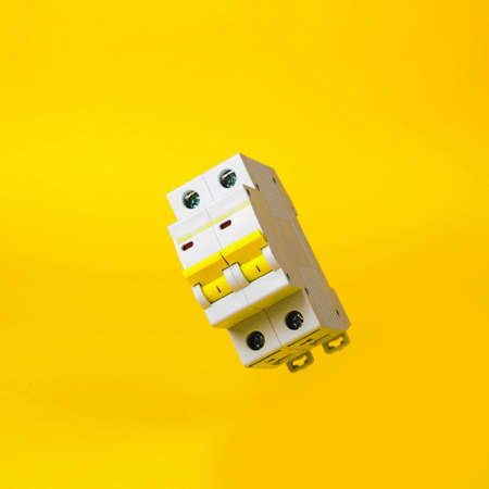The circuit breaker on a yellow background