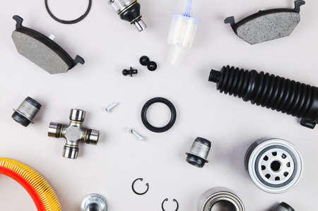 Set of car parts for maintenance on grey backgroundの写真素材