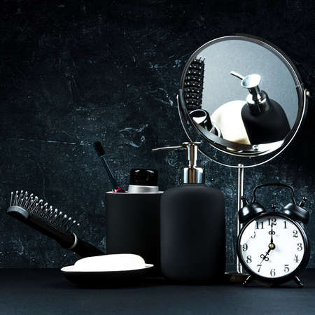 Accessories for morning hygiene on a black backgroundの写真素材