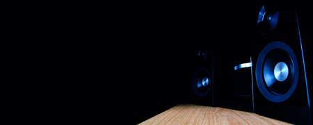 Modern CD player on a dark background. Space for text or design