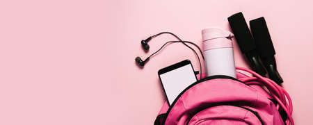 Sports bag and accessories on pink backgroundの写真素材