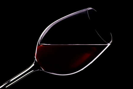 Glass of wine in blackの写真素材