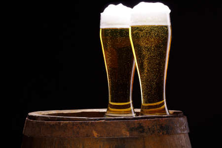 glass of beer with barrelの写真素材