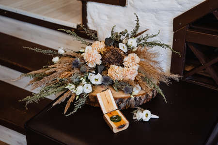 wedding bouquet of the bride, boho style, outdoor, dry flowers