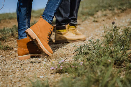 four legs, Hiking shoes, walking on the mountain road, trekking shoes, outdoors, outdoor, pairの写真素材