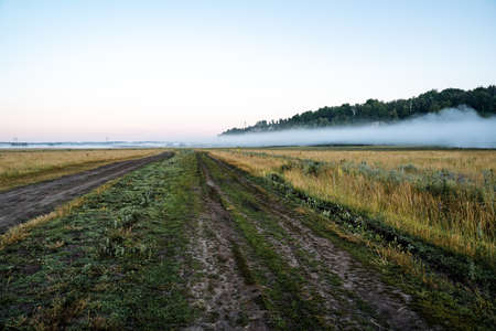 mountain view of fog in the early morning, nature of Russia, fog below, travel in nature, summer landscape, forest and mountainsの写真素材