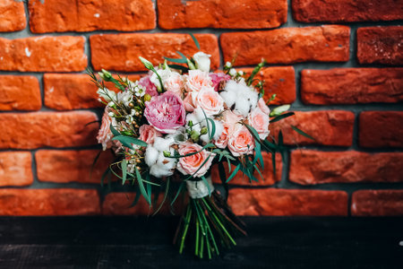 brides bouquet, wedding bouquet, bouquet of fresh flowers, stands on the table, flower arrangement in the shape of a ball, wedding Floristicsの写真素材