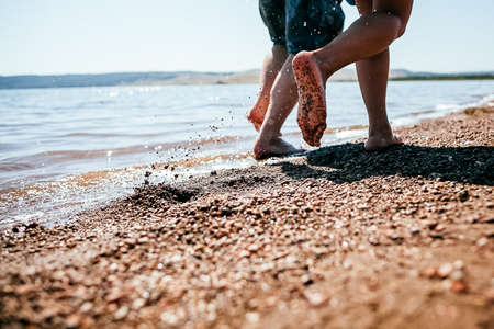 walking in the woods, shoes on feet close-up, legs to the kneeの写真素材