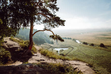 mountain view of the lake in the early morning, nature of Russia, fog below, travel in nature,...