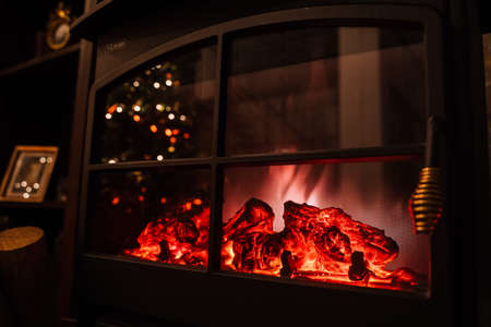 Open fireplace, fire, electric stove, red coals glowの写真素材