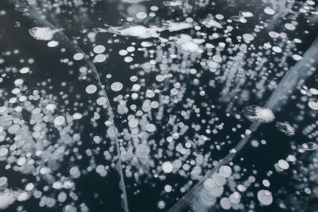 bubbles on ice, a winter ice on the river, the ice of lake Baikal
