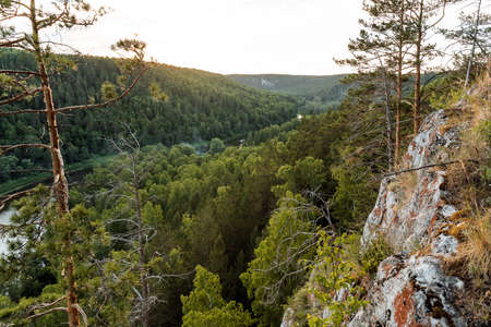Mountain river. Southern Ural Russia River Ai. taiga landscape on the mountain. Rocks in the middle of the forest.の写真素材