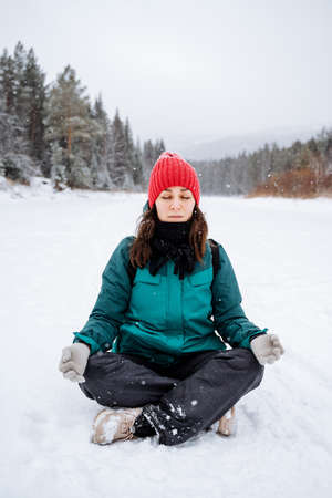 Spiritual and emotional concept of harmony with nature in maternity time. Pregnant woman practicing...