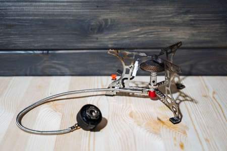Gas burner. Camping stove for cooking in nature. Source of fire and heat. Gas burner at homeの写真素材