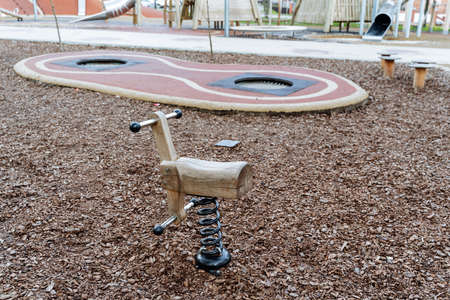 Wooden horse for children's fun, children's playground, covering wood cara, place for children to...