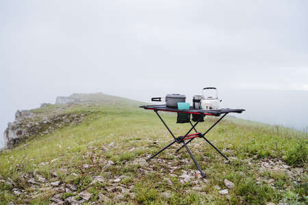 Tourist kitchen mini stands on the top of the mountain without people, the concept of outdoor...