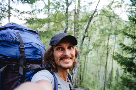 Selfie on the phone for a story in a social network, a guy will shoot a video for a blog, a traveler...