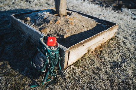 Camping equipment, first aid kit for hiking, backpack on the ground, pack things for the road. High quality photoの写真素材
