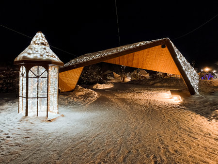 Street lighting of the city park, winter evening, art objects on the city street, lighting with garlands for the holiday. High quality photoの写真素材