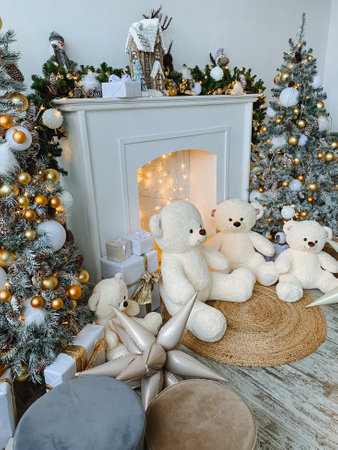A cozy group of fluffy teddy bears is by a warm fireplace, surrounded by beautifully decorated Christmas trees, creating a magical scene full of holiday cheer and joy for the festive seasonの写真素材