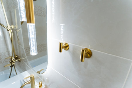 A wellequipped bathroom featuring essential amenities such as a sink, a shower, and a mirror,...