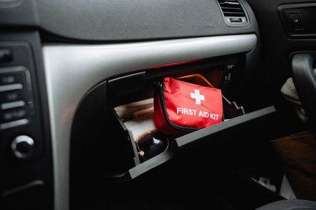 A wellorganized first aid kit in the cars glove compartment is essential for effectively handling emergencies while traveling. Safety and preparedness can make a significant differenceの写真素材