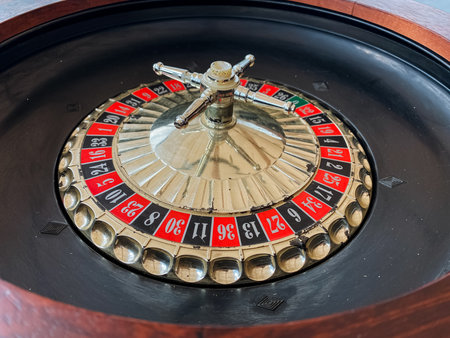 This image features a detailed closeup view of a roulette wheel, prominently displaying the number 11, which is an important aspect of the game. It represents excitement in the world of gamblingの写真素材