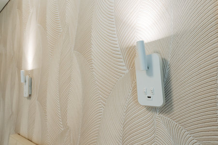 In the room, there are actually two lights that are installed on the wall, illuminating the space...