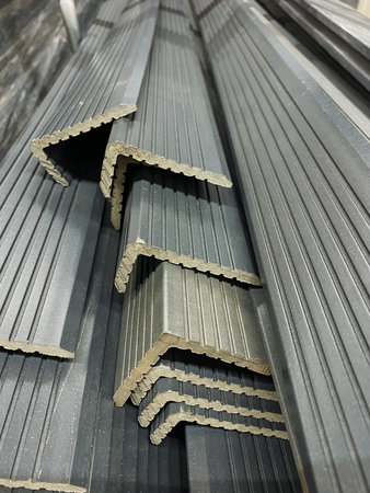 A meticulously organized and stacked collection of metal angles is crucial for structural applications in a wide range of construction and fabrication projects across various industriesの写真素材